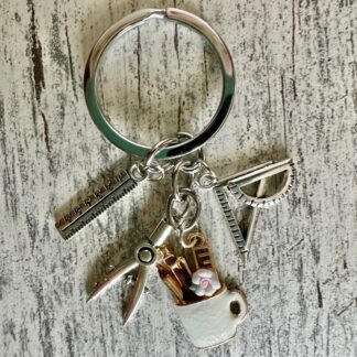 Schlüsselanhänger mit Utensilien für das Büro